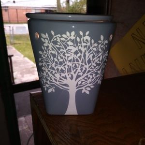 CERAMIC LIGHTED CANDLE BURNER.